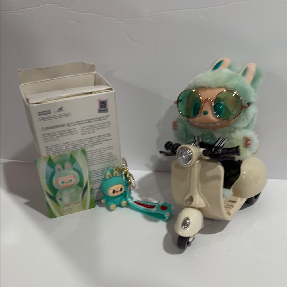 Labubu (Serenity) with North Face outfit & Cream Scooter & GreenLabubu Keychain